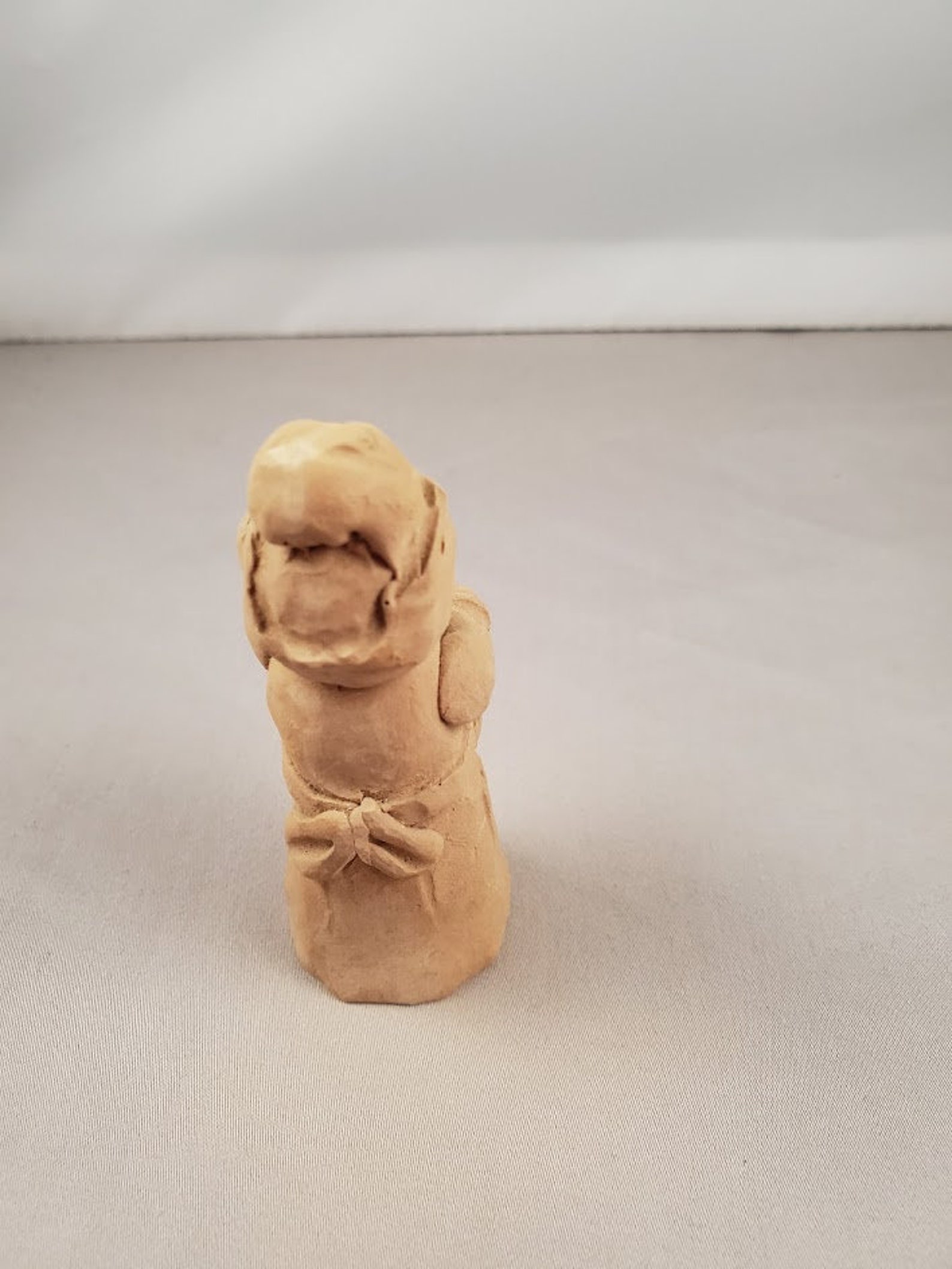 unpainted pecan resin figurines
