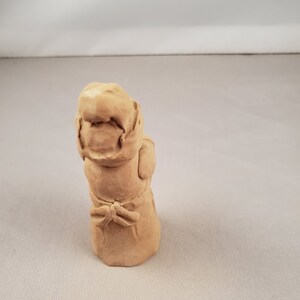 unpainted pecan resin figurines