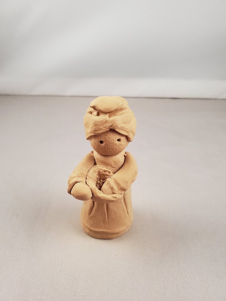 unpainted pecan resin figurines