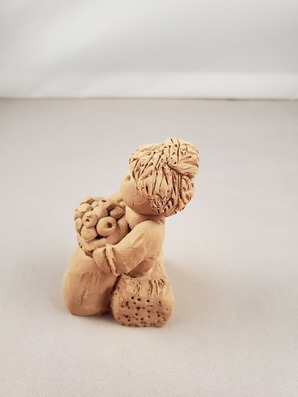 unpainted pecan resin figurines