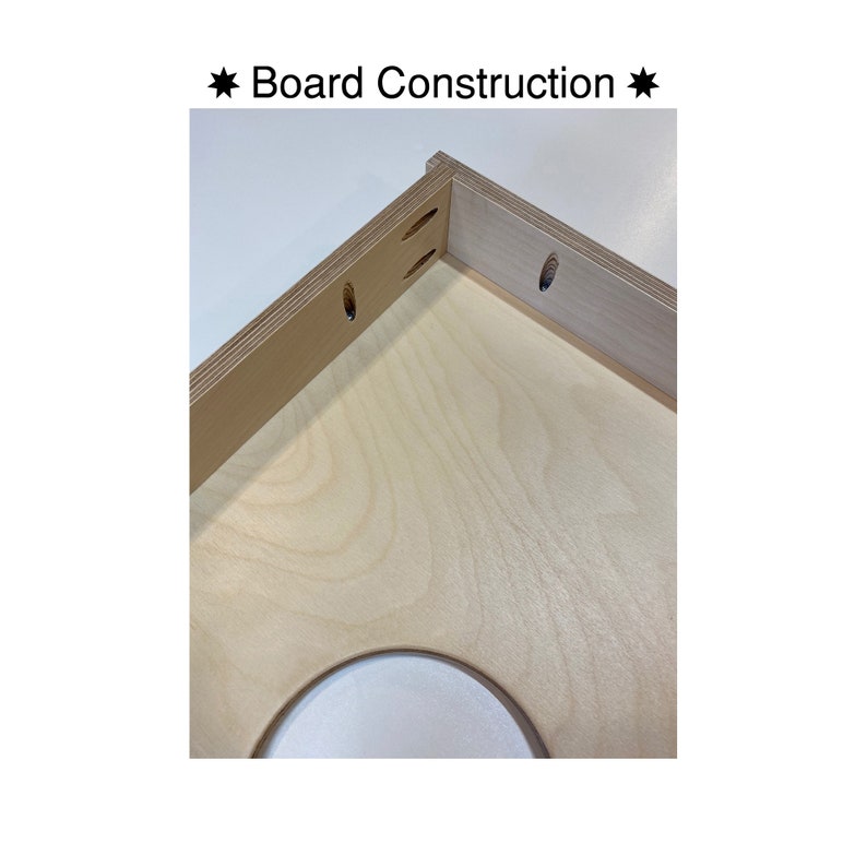 May include: Close-up of a corner joint of a wooden board, showing the construction details. The board is made of light-colored wood with a smooth surface. The joint is secured with screws and dowels.