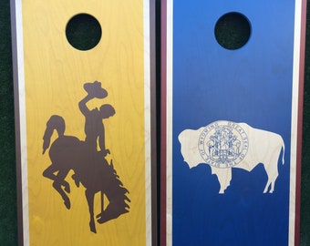 Cornhole Game by Colorado Joe's Wyoming Flag and Wyoming Steamboat