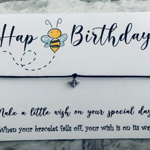 Alles Gute zum Geburtstag Geschenk Wunsch Armband. Machen Sie einen Wunsch Geschenk. Freundin, Schwester, Ehefrau, Tante. Hummel. Aufmerksames Geschenk, um jemanden wissen zu lassen, dass Sie ihn mögen.