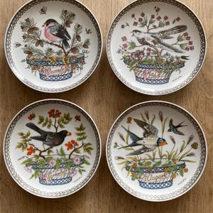 Set of 4 German China Hutschenreuther birthmonths platea with birds