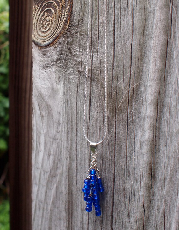Items similar to Blue bead drop necklace on Etsy