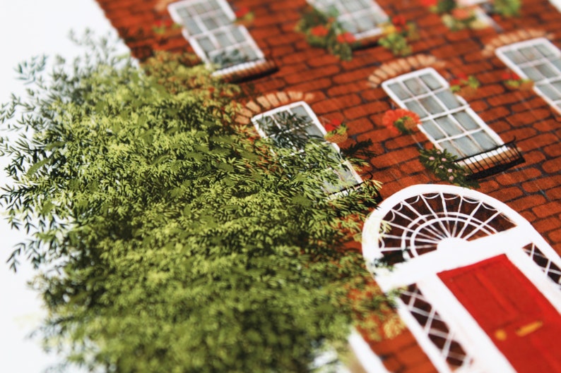 May include: A red brick building with white windows and a red door. The building is covered in green vines and has a white arched doorway.