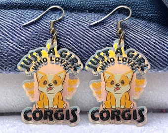 Nur ein Mädchen, das Corgis schillernde Ohrringe liebt