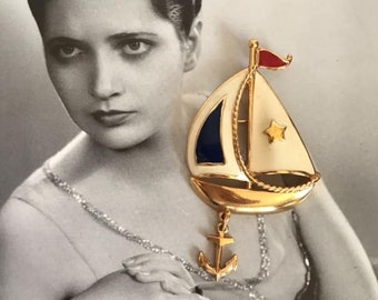 Vintage 1980's 1990's Brooch Pin Signed *AVON* Sailboat With Anchor Brooch Gold Tone COLOR With Red/Blue/Cream