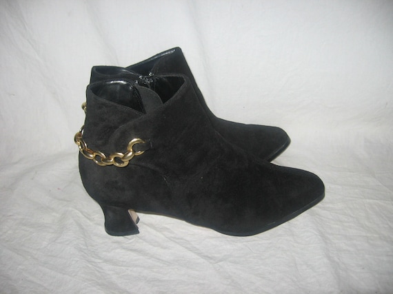 Black booties with gold zipper hot sale