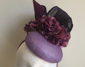 New purple fascinator with silk abaca loops, flowers and feather on a headband!