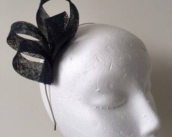 Navy loop fascinator on a metal headband. Stunning on!