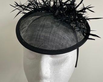 Black hatinator with biot feathers on a headband!