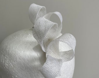 White sinamay loop fascinator on a headband!