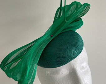 Green fascinator with silk abaca loops and barb quill