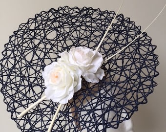 Stunning navy basket weave fascinator with white flowers and quills!