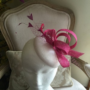 Gorgeous white round fascinator with magenta loops, feathers and netting. Made to order image 1