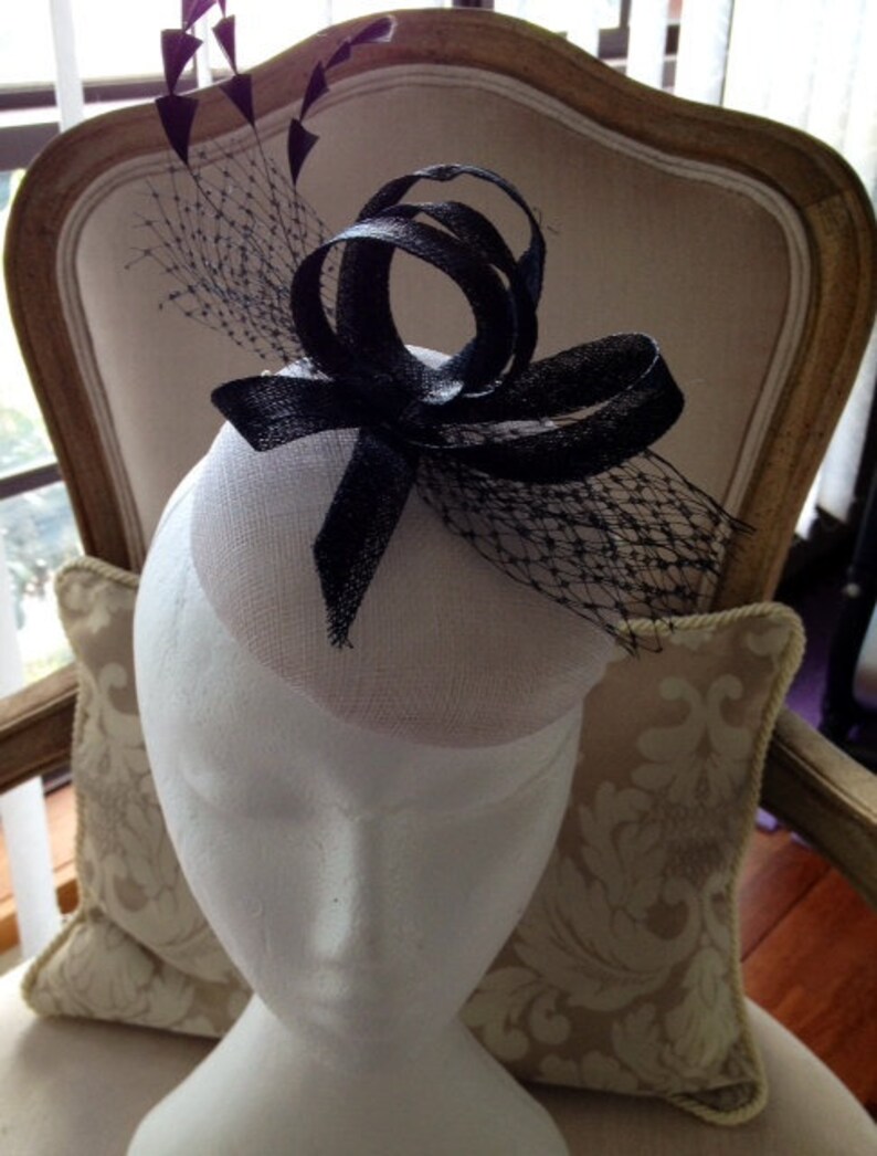 Beautiful White Fascinator Base With Black Loops, Netting and Feathers
