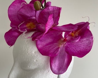 Magenta orchid fascinator on a silver headband!