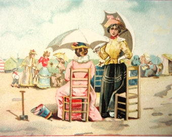 Old french tradingcard - Two women, sea beach summer, parasol chair, drawing embossed relief Victorian trade card 1900, add La Menagere