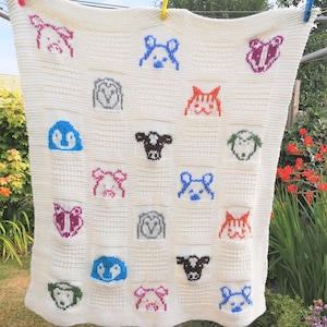 Knitting Pattern for Baby Blanket featuring animal characters - bear, pig, sheep, cow, penguin, cat, owl, badger. 10 ply yarn Intarsia knit