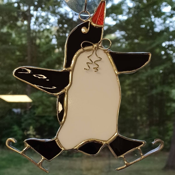 Penguin on skates Stained Glass Suncatcher. Winter Fun. Hand Made Suncatcher Gift. Unique gift. 7" x 6".