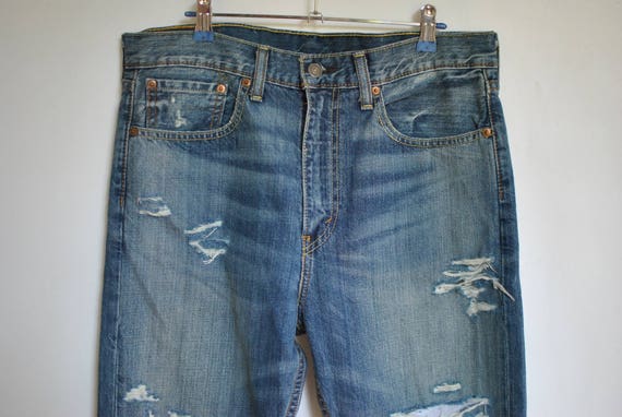 Vintage LEVI'S MEN'S JEANS , ripped jeans , distre