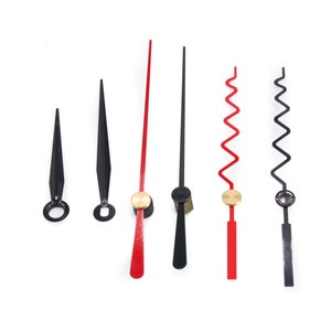 Pode incluir: Conjunto de seis ponteiros de rel&oacute;gio em preto e vermelho. Os ponteiros s&atilde;o feitos de metal e t&ecirc;m estilos diferentes, incluindo retos, pontiagudos e ondulados.