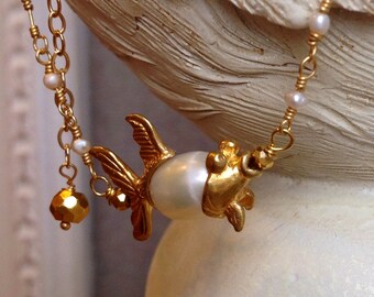 Gold and Pearl Fish Charm Necklace