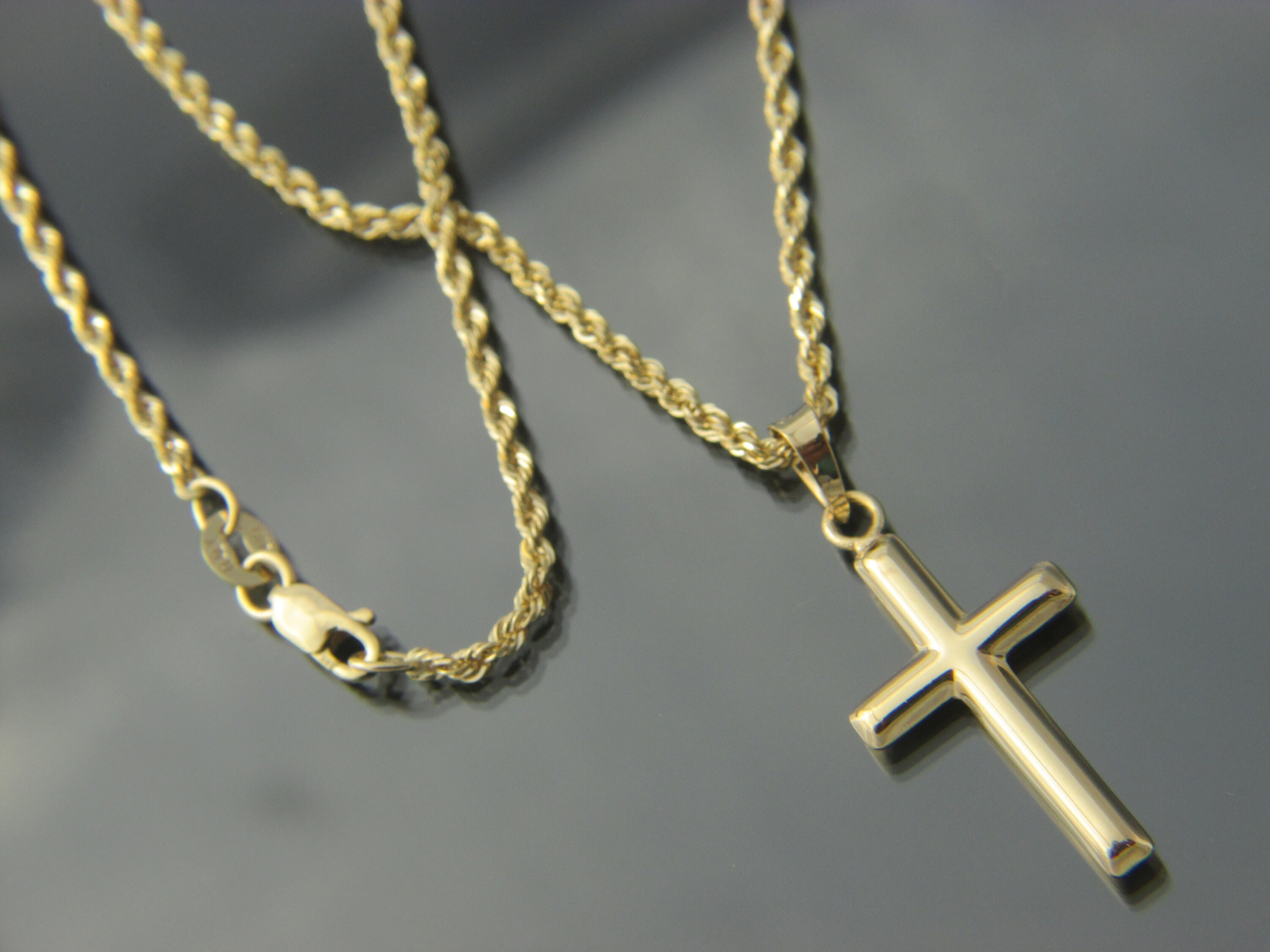 Looking for a small gold crucifix ( just the cross no Jesus