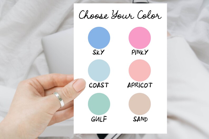 May include: A white card with the text "Choose Your Color" and six color swatches labeled "Sky", "Pinky", "Coast", "Apricot", "Gulf", and "Sand".