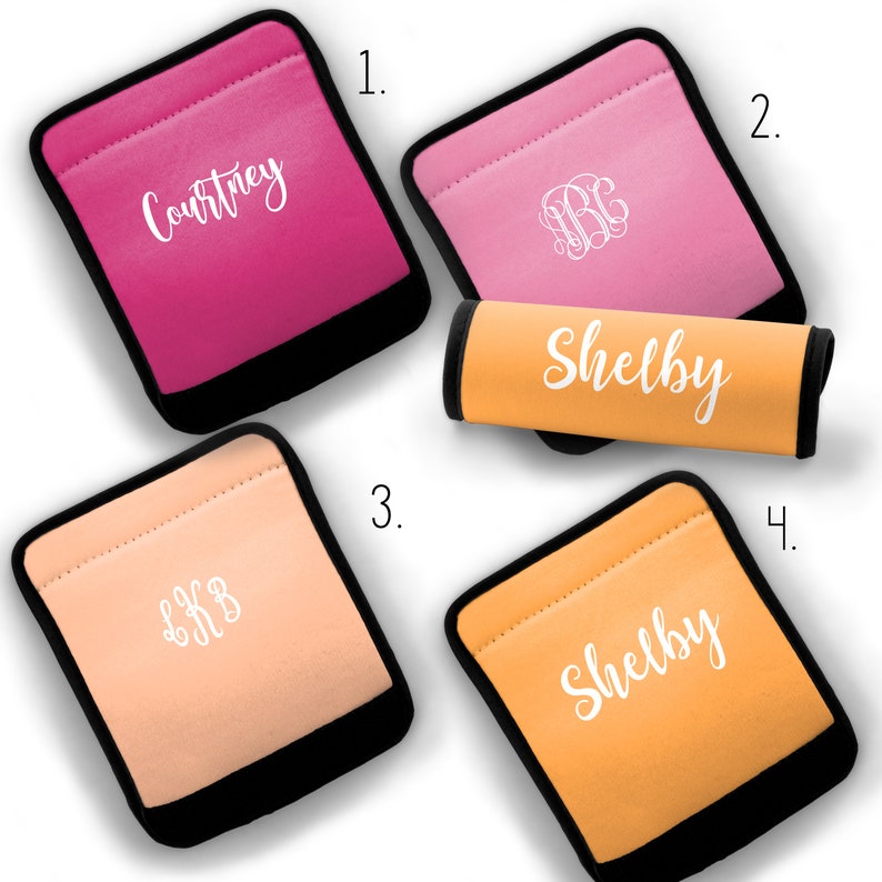 May include: Four different car seat handle covers. Two are pink with black trim, one is peach with black trim, and one is orange with black trim. The covers are personalized with names and monograms.