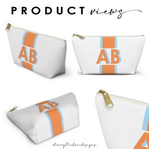 Op de afbeelding: Witte ritszak met een blauwe en oranje streep en de letters "AB" in blauw aan de voorkant.