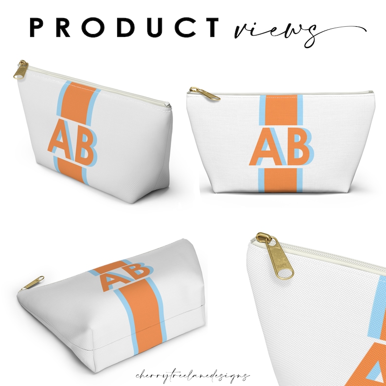 Op de afbeelding: Witte ritszak met een blauwe en oranje streep en de letters "AB" in blauw aan de voorkant.