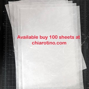 May include: A stack of 100 white sheets of paper with a subtle textured surface. The text "Available buy 100 sheets at chiarotino.com" is printed in red on the top sheet.