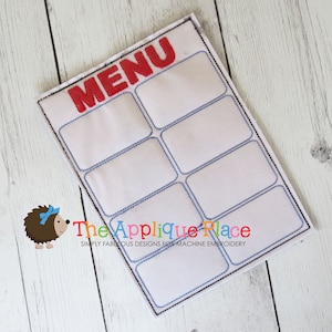 May include: A white fabric menu board with a red embroidered "MENU" title and eight blank rectangular spaces outlined in blue thread.