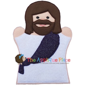May include: A felt finger puppet of Jesus wearing a blue robe. The puppet has a brown beard and hair, and a white face with brown eyes.