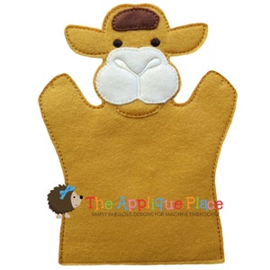 May include: A camel hand puppet made of tan felt with a brown headpiece and white facial features. The puppet has a stitched outline and the text "The Applique Place" in the bottom right corner.