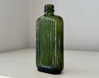 Vintage POISON embossed ribbed flat green glass bottle 1910s