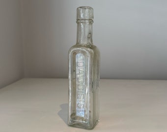 Early 1900s Large clear glass vintage Daddies Sauce Bottle