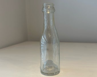 Small Plain BVP Ltd clear glass bottle - retro display piece