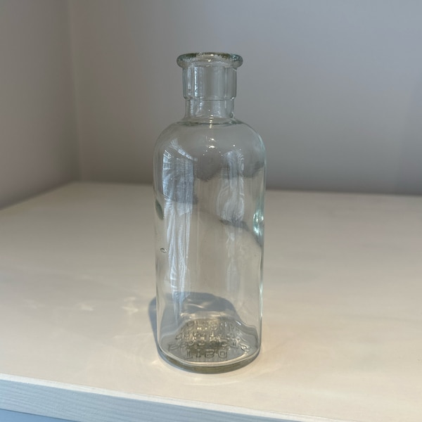 Medium TIBO Products Company London vintage clear glass bottle