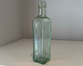 Gran botella vintage de vidrio aqua de ESS Camp Coffee & Chicory Patersons Glasgow de la década de 1890