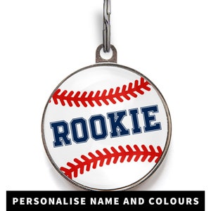 Baseball dog tag with red stitching, featuring pet's name in blue. Other colours available.