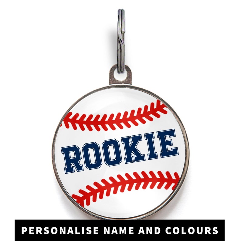 Baseball dog tag with red stitching, featuring pet's name in blue. Other colours available.