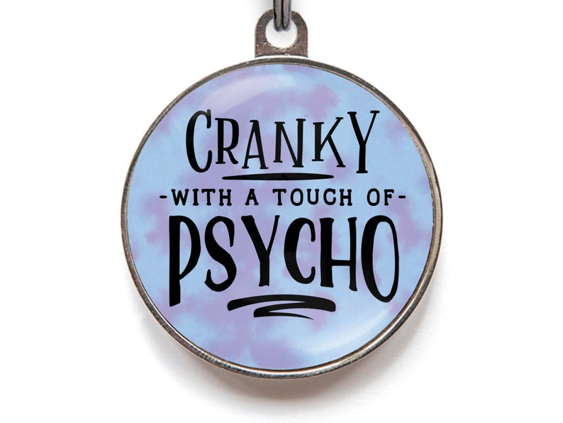 Funny dog tag - Cranky with a touch of psycho. Shown in cloudy blue