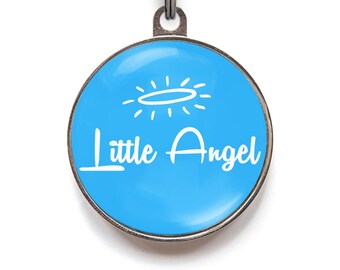May include: A blue round pet tag with a white halo and the text "Little Angel" on it.