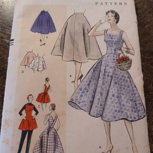May include: A vintage Vogue sewing pattern for a dress with a full skirt. The pattern includes four different styles: a sleeveless dress with a scoop neck, a dress with a scoop neck and short sleeves, a dress with a scoop neck and long sleeves, and a skirt. The pattern is for size 30 bust, 33.