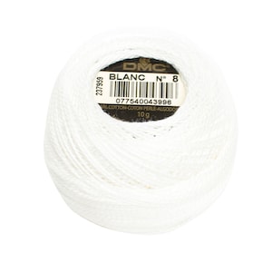 May include: A ball of white DMC Blanc cotton thread, No. 8, weighing 10 g. The label includes a barcode and the number 237959. The thread is tightly wound, showing the texture of the cotton.