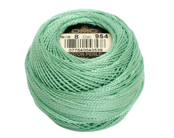 May include: A ball of DMC Perle 8 cotton embroidery thread in a light green color. The label reads "Perle 8 Col 954" and includes a barcode with the number 077540043538.