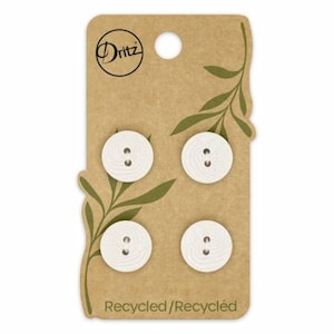 May include: Four white recycled buttons with two holes each on a brown card with green leaves and the text "Dritz" and "Recycled/Recycled".